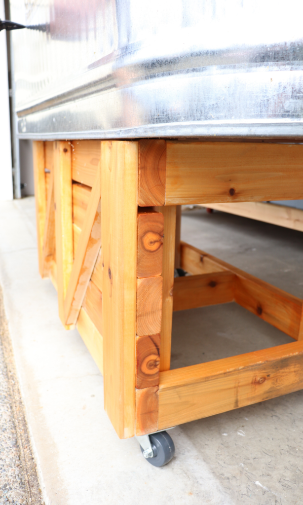 galvanized horse trough planter box on cedar wood stand