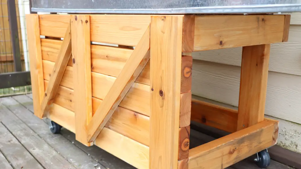 galvanized horse trough planter box on cedar wood stand