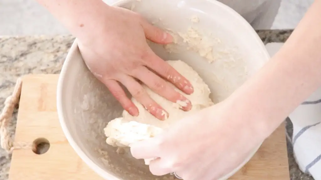 Lifting and stretching the dough