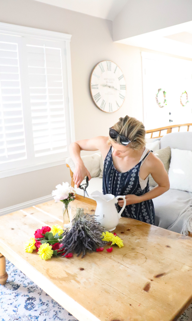 cutting fresh flowers in the farmhouse