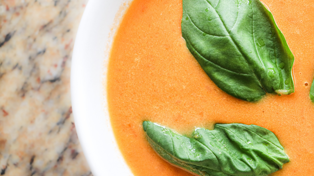 https://theduvallhomestead.com/wp-content/uploads/2020/07/1-homemade-tomato-soup-how-to-make-tomato-soup-from-scratch-easy-recipe-healthy-dinner-ideas-family-recipes-fresh-basil-creamy-tomato-soup-1024x576.png