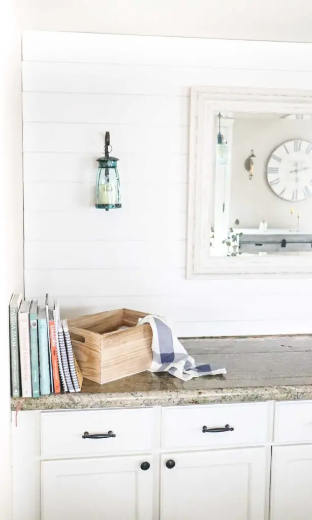 This charming farmhouse shiplap accent wall can give any modern home that classic old world farmhouse style. Learn this easy shiplap DIY to turn any wall of your home into charming farmhouse shiplap. 
