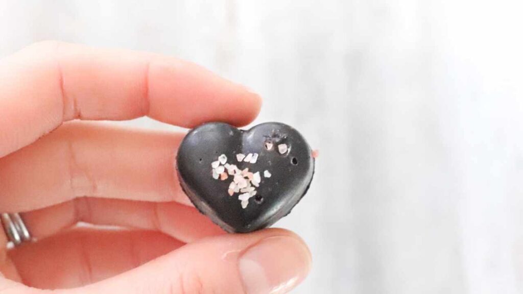 Learn how to make homemade chocolate with this easy recipe. These chocolate hearts are naturally flavored with orange and salt, making each bite melt in your mouth.