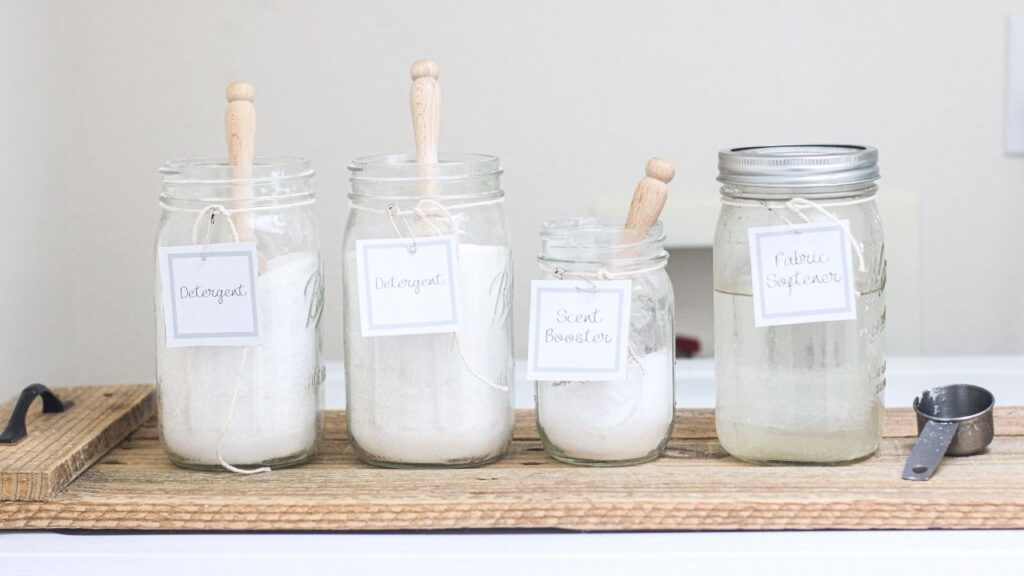 glass mason jars used in a farmhouse laundry room makeover