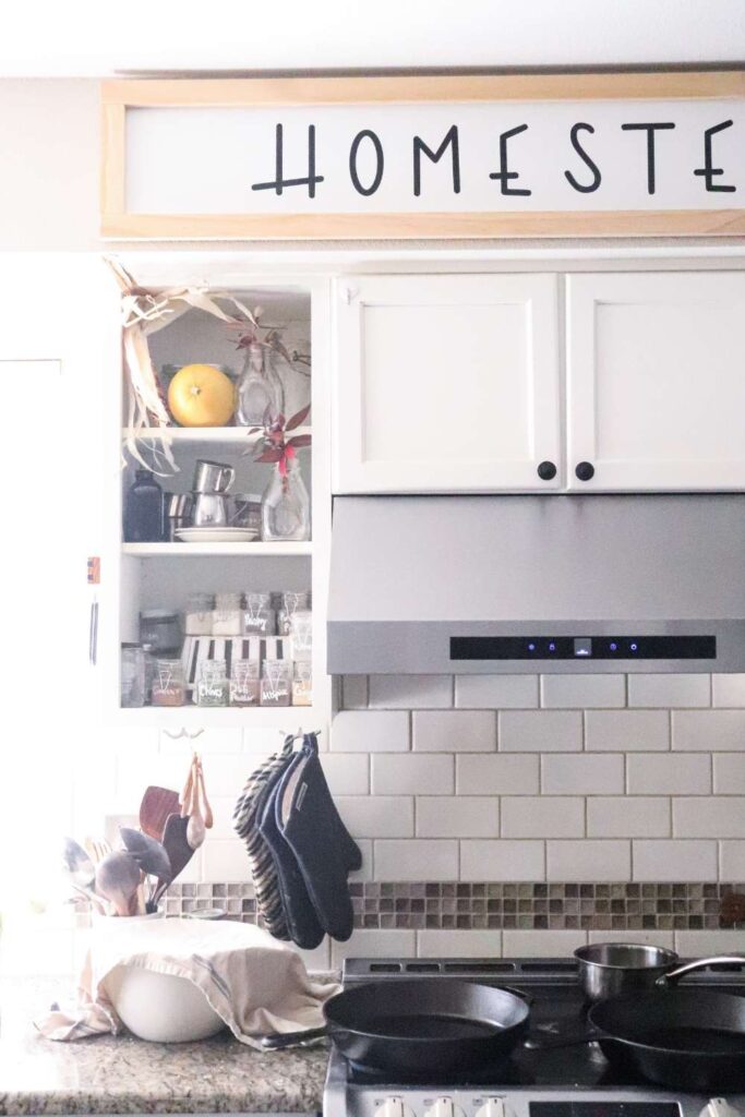 kitchen shelves with pumpkins