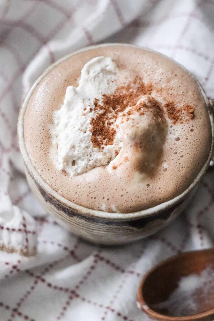 Learn how to make a homemade mocha that is naturally sweetened and topped with homemade whipped cream for your family this season. 

#homemade #mocha #coffee #naturallysweetened #homemademochasyrup #homemadewhippedcream #healthy #delicious #christmasrecipes