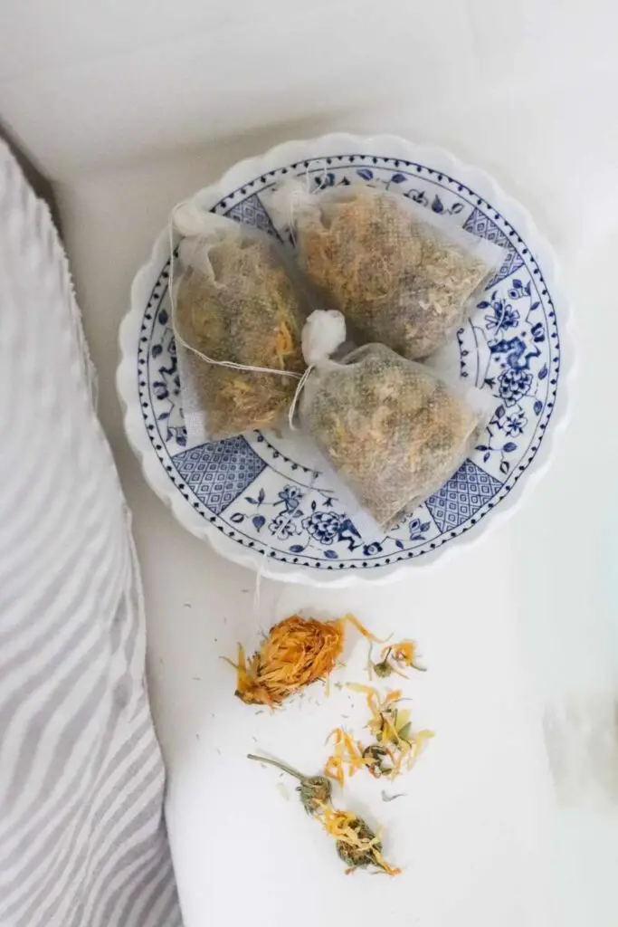 homemade bath tea with dried flowers calendula and chamomile for baby