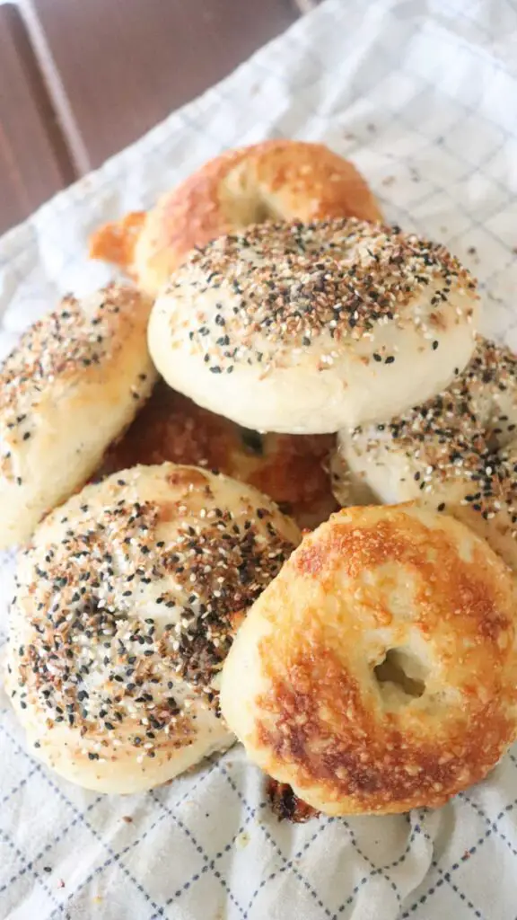 finished sourdough bagels with crispy cheese topping