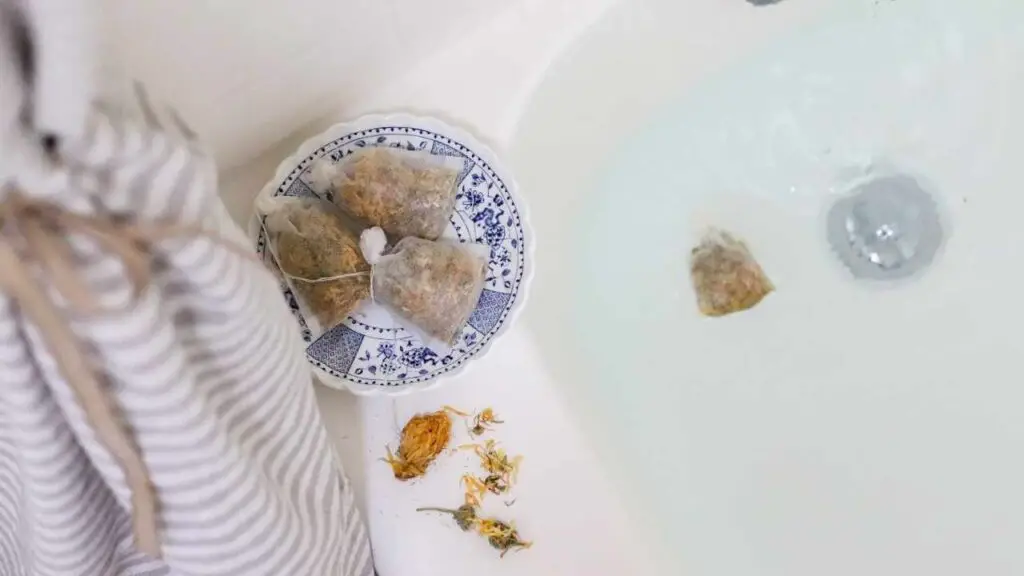 homemade bath tea with dried flowers calendula and chamomile for baby