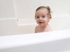 baby in bath tub using homemade baby shampoo