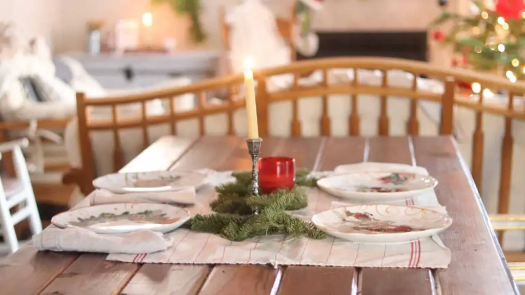 Farmhouse dining table with a simple Christmas tablescape