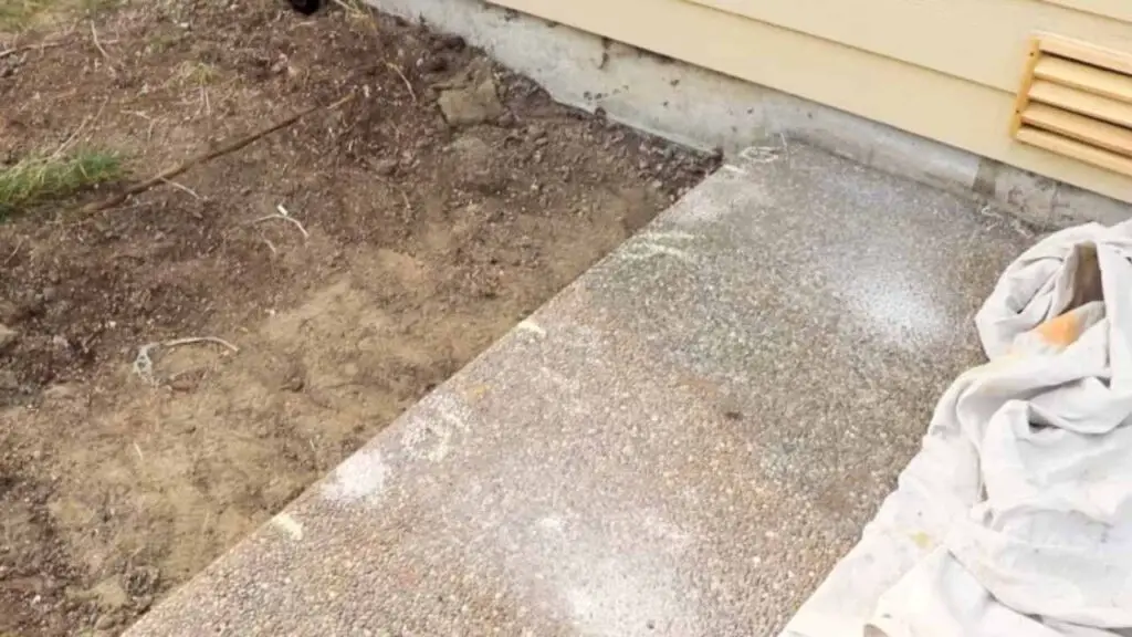 chalk marks showing where soil void is under concrete slab