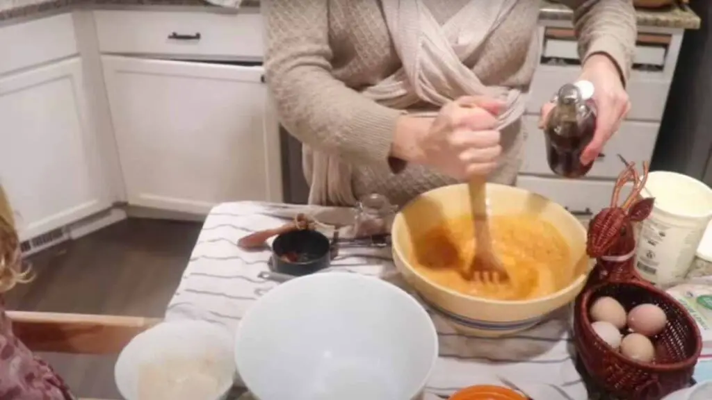 Mixing wet ingredients for pumpkin protein einkorn muffins