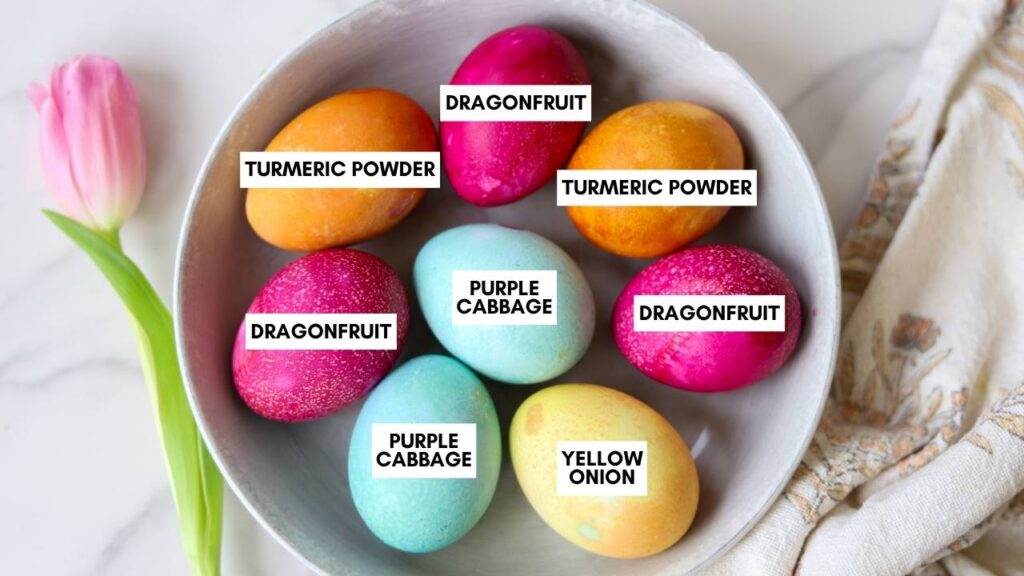 Bowl of dyed Easter eggs labeled with natural dye ingredients