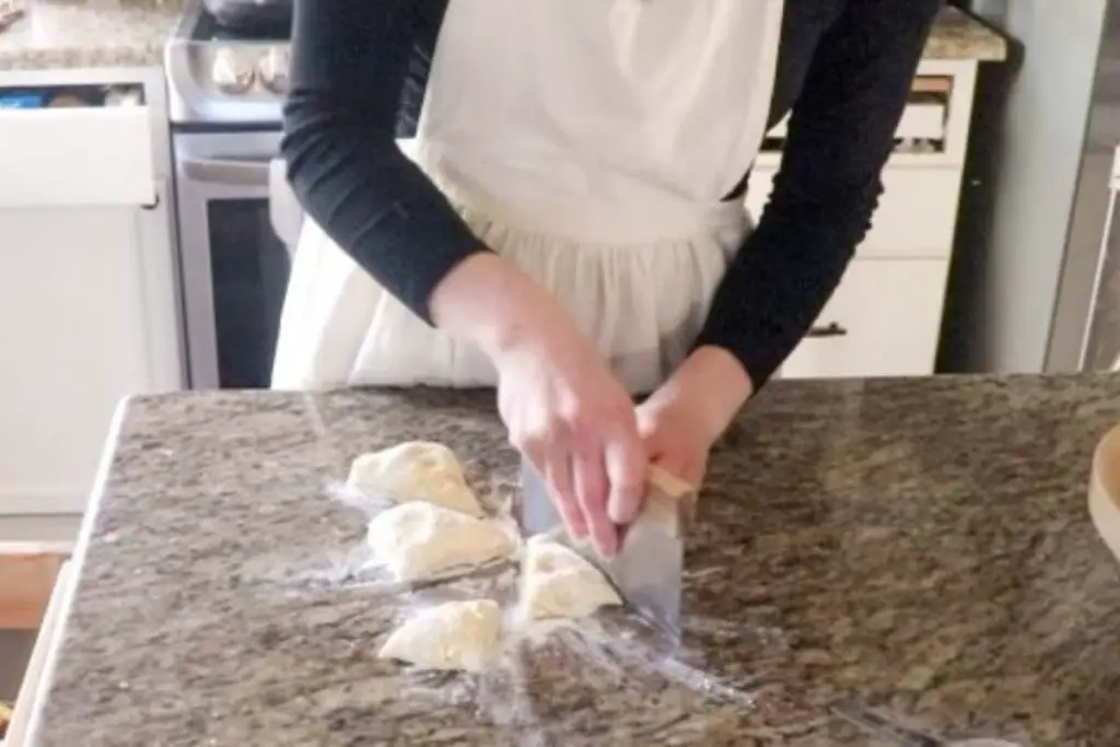 dividing einkorn sourdough discard tortilla dough into balls