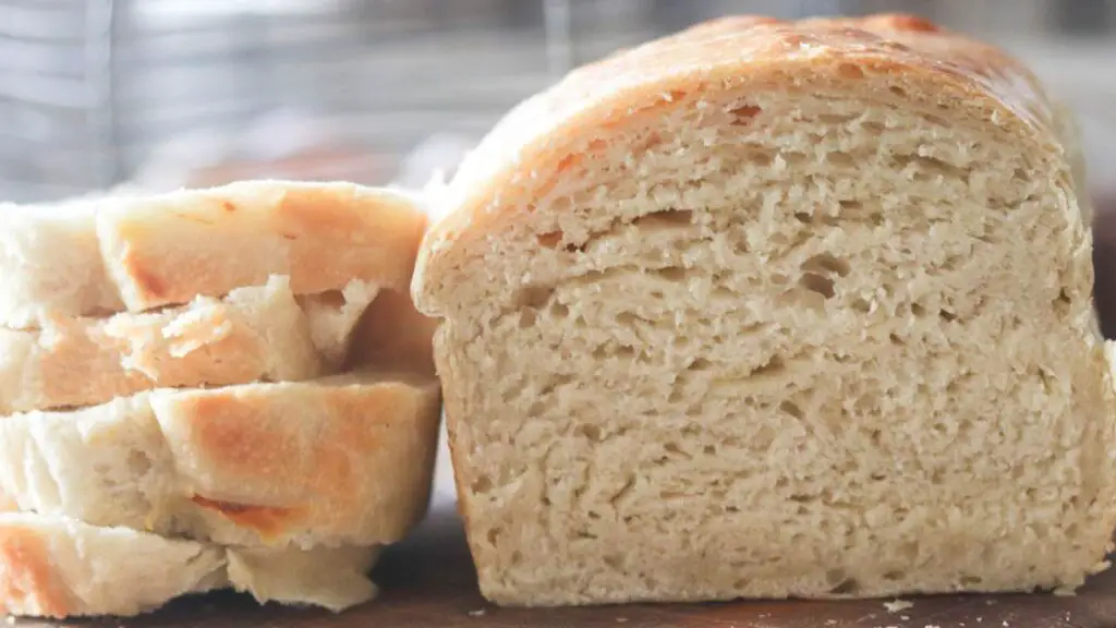 A close-up of sourdough sandwich bread freshly cut. 