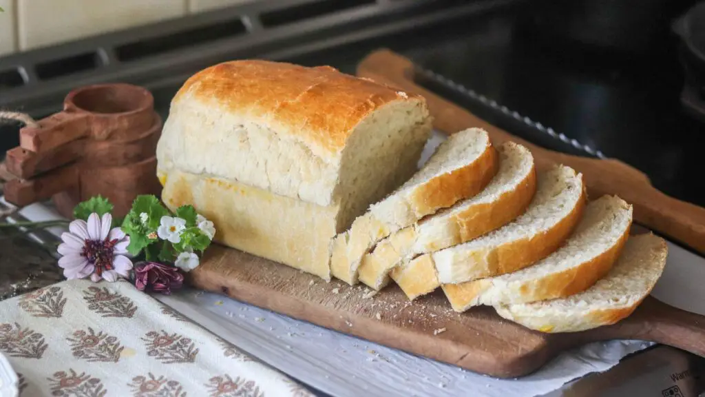 sourdough sandwich bread sliced on a cutting board