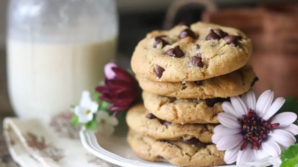 brown butter einkorn chocolate chip cookies with a glass of milk