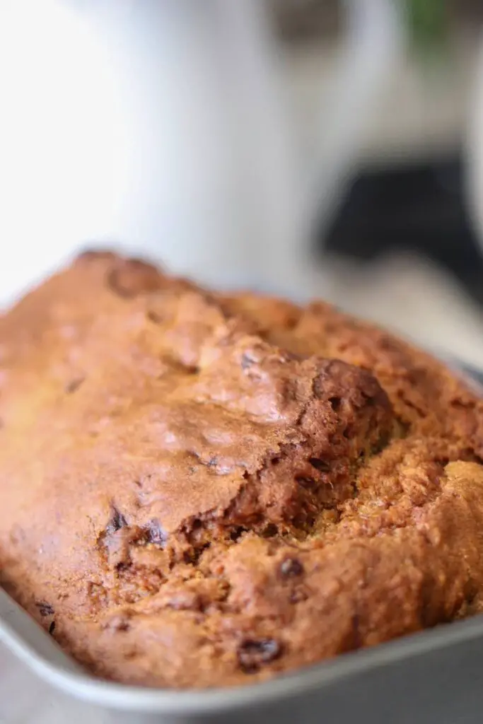 A close-up of a whole loaf of banana bread. 