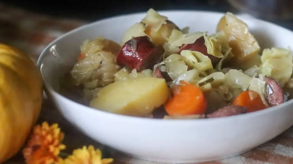 A bowl of bratwurst soup.