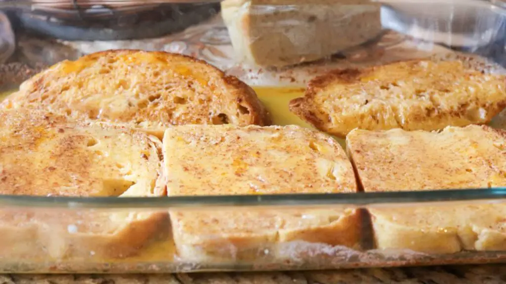 Bread slices soaking in the milk miture.