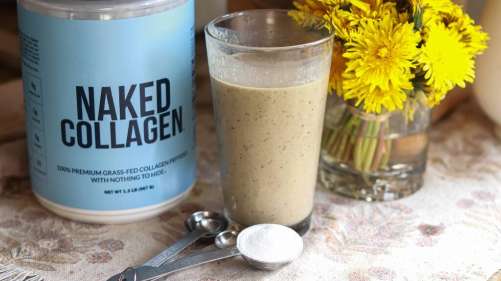 A jar of naked collagen next to a smoothie and a tablespoon of collagen powder. 