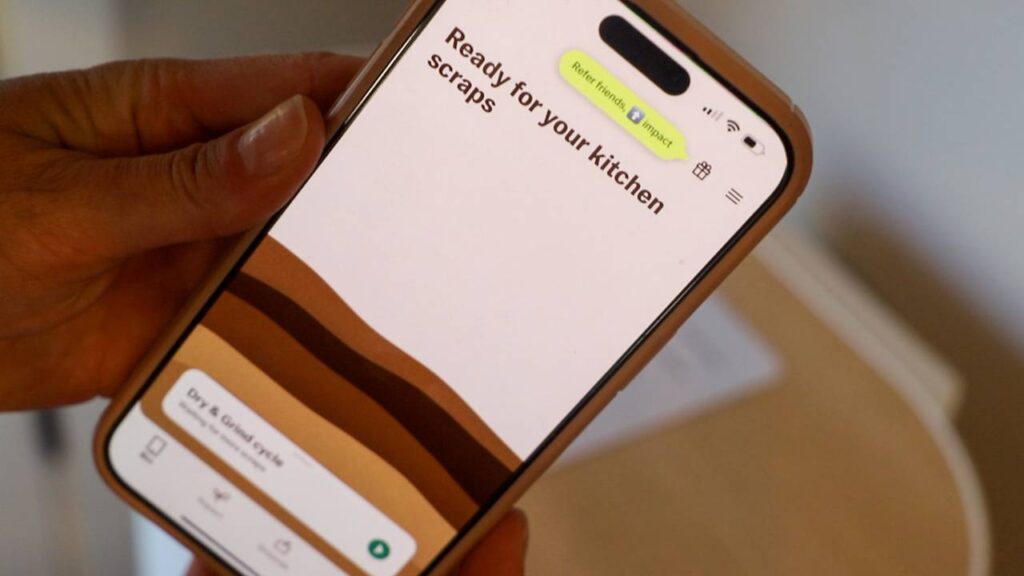 Smartphone showing the Mill app screen that reads “Ready for your kitchen scraps.”