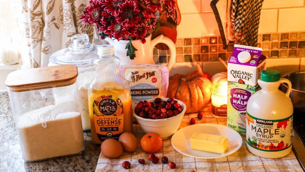Ingredients for einkorn cranberry orange bread on the counter