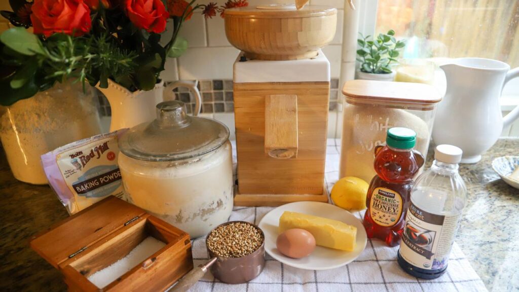 Ingredients for whole grain sugar cookies arranged on a kitchen counter
