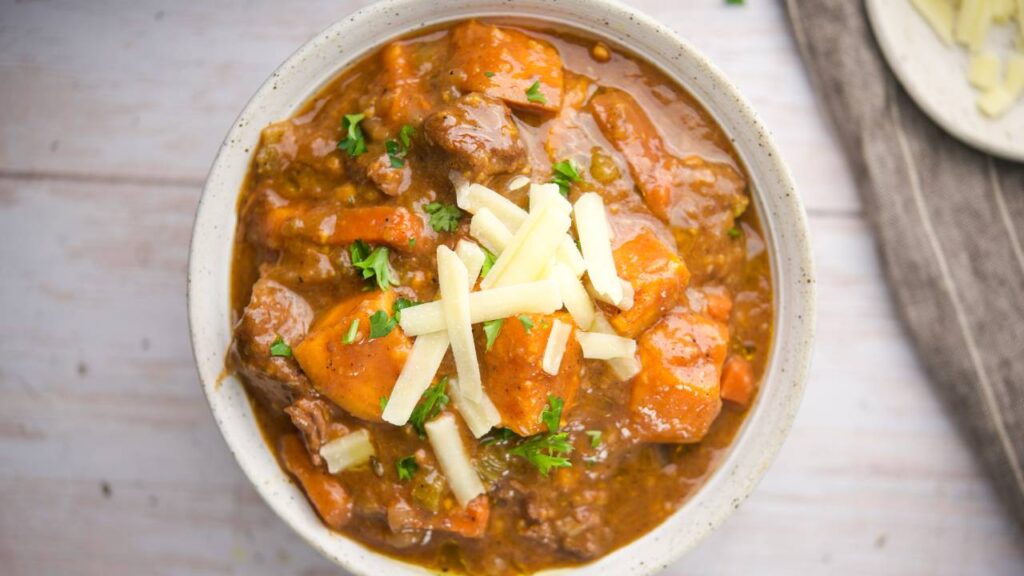 Close-up of pumpkin beef stew with chunks of beef and pumpkin