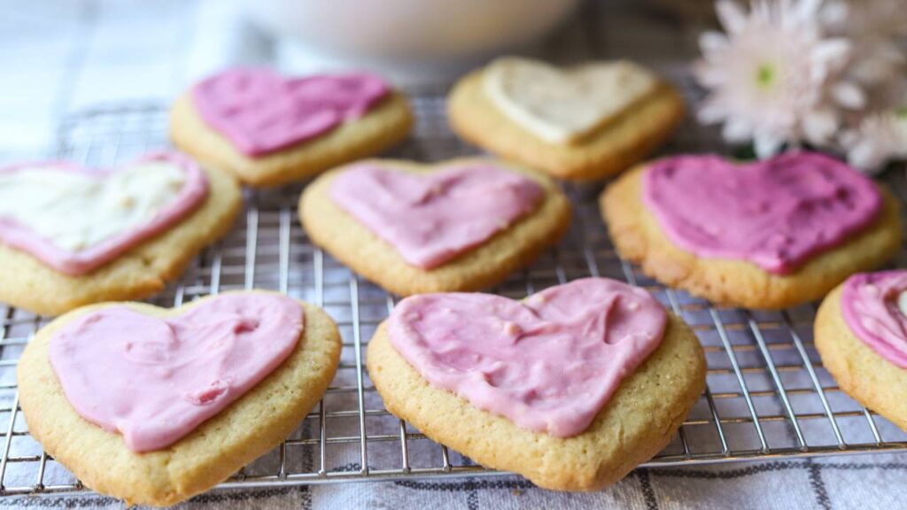 Decorated einkorn lemon sugar cookies with pink icing hearts