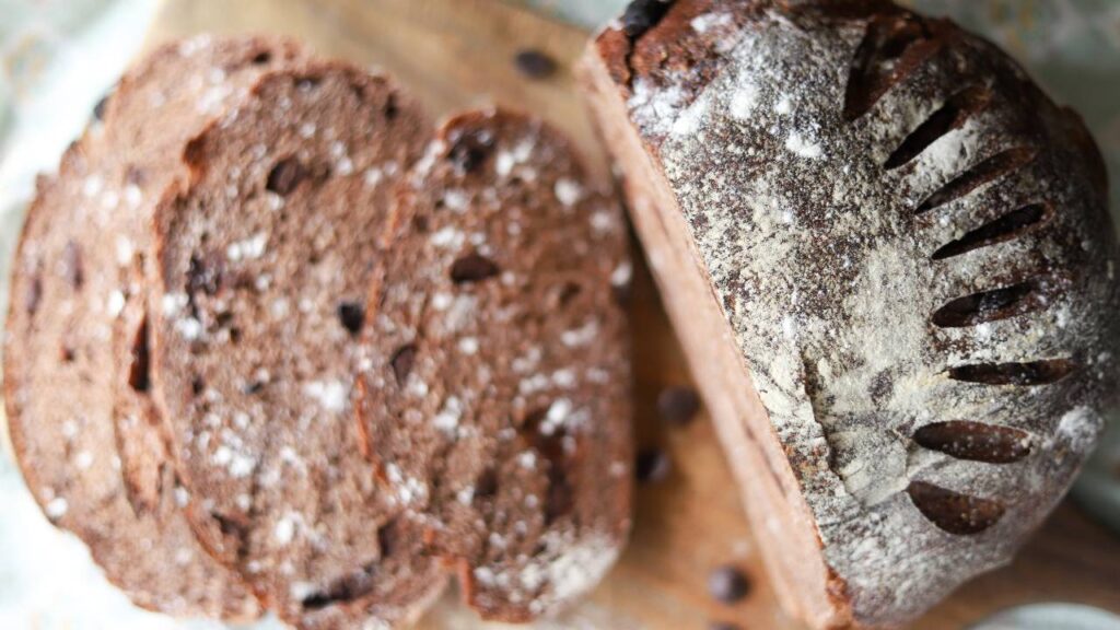 Overhead view of sliced sourdough chocolate bread loaf