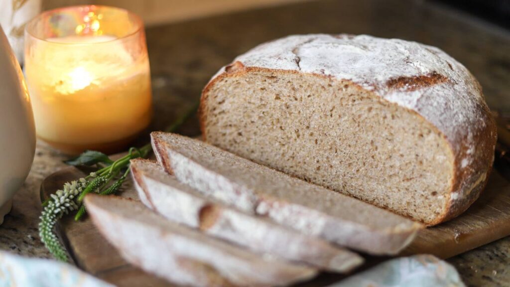 Sliced whole grain sourdough buttermilk bread showing soft crumb