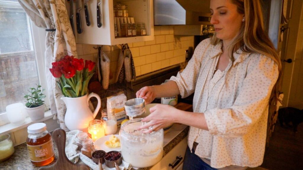 Mixing sourdough einkorn hot cross bun dough with einkorn flour and ingredients