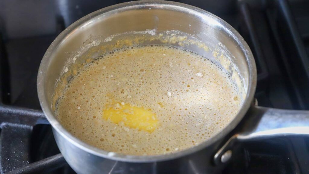 Homemade roux cooking in saucepan for broccoli cheddar soup