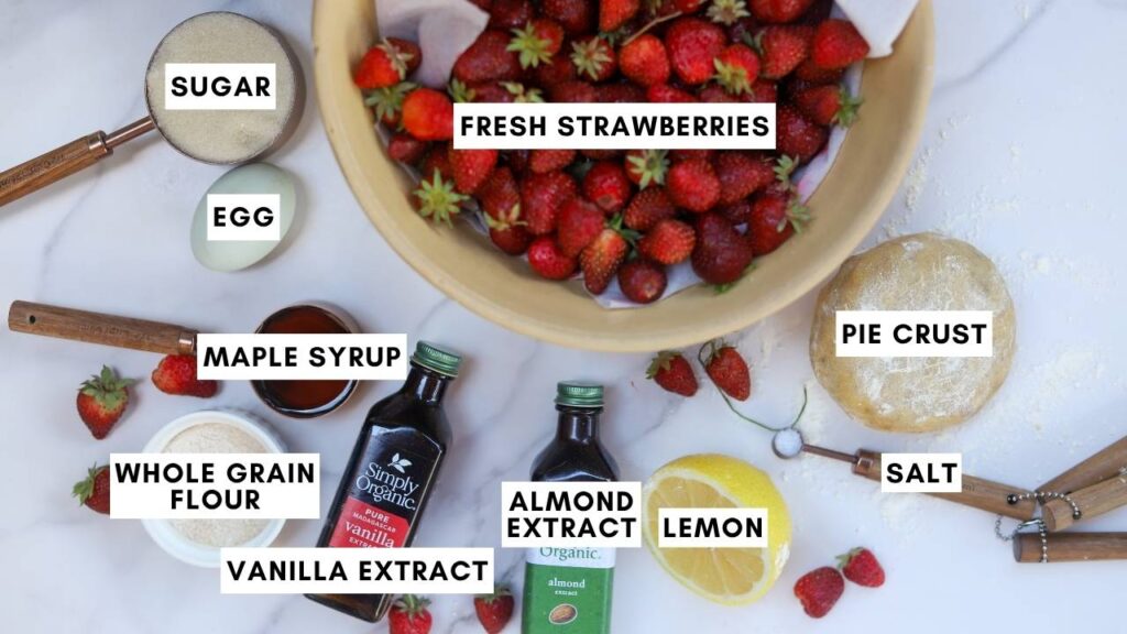 Ingredients for homemade mini strawberry pies with fresh strawberries