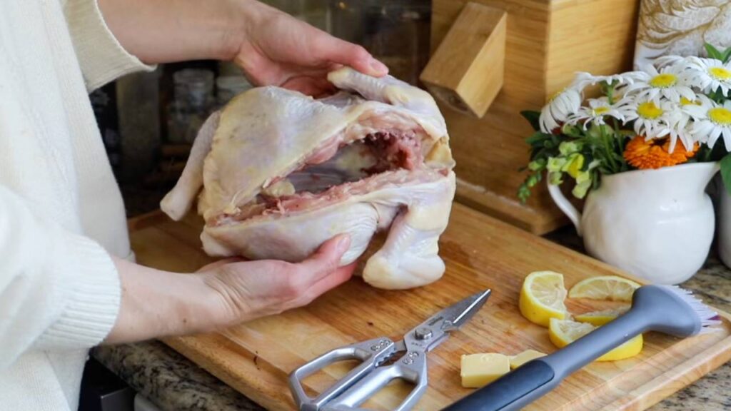 Whole chicken opened after the backbone has been removed.
