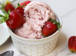 Homemade strawberry ice cream with fresh strawberries