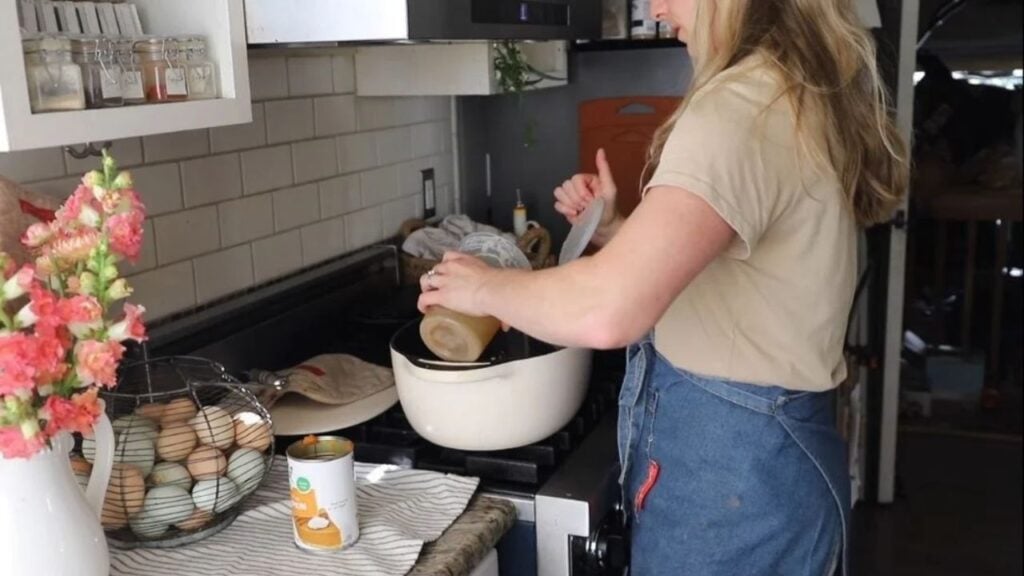 Food storage containers organized in a cozy homestead kitchen.
